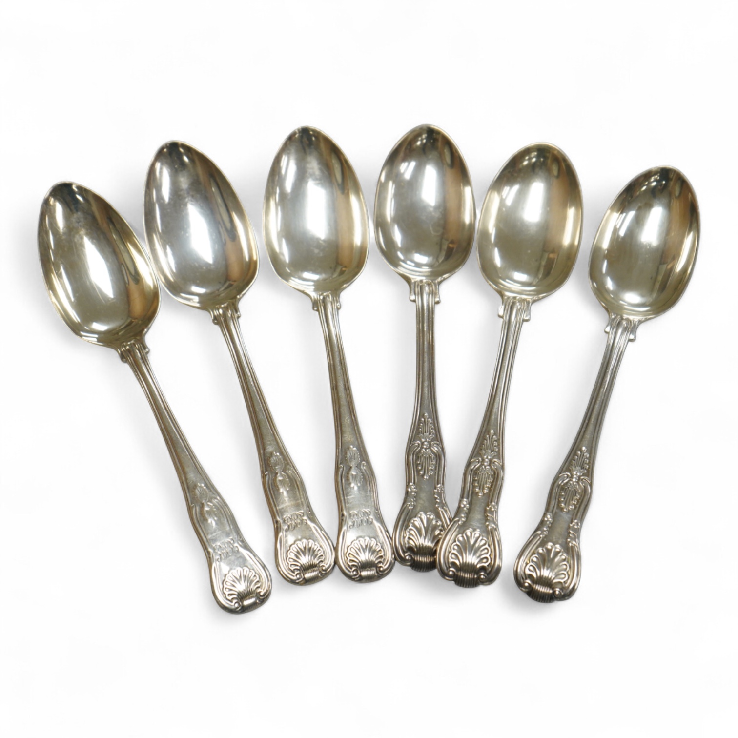 A matched set of six Victorian silver Kings pattern dessert spoons, including three by George Adams, London, 1865, 11.9oz.